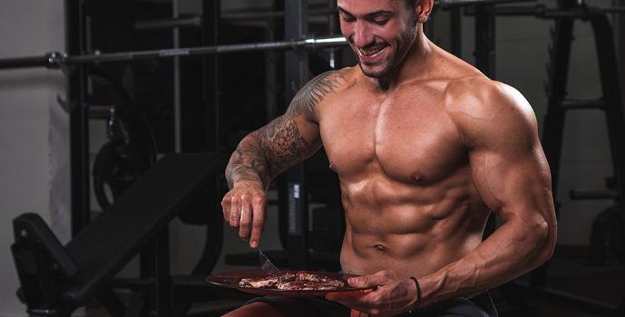 bodybuilder eating high calorie foods